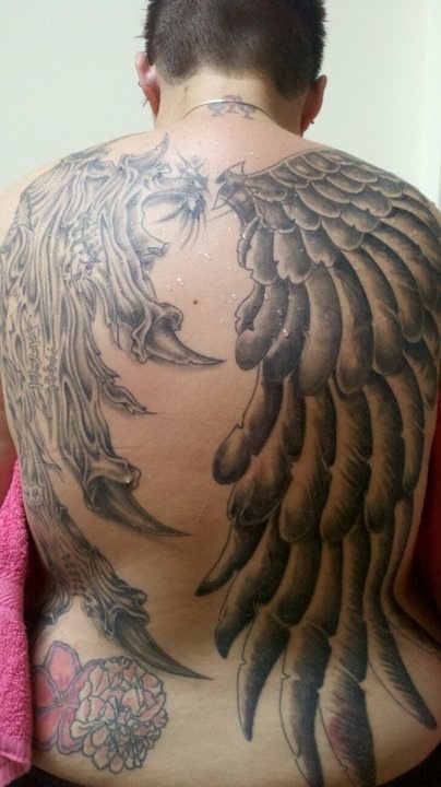 Fotos de tatuagens de asas 49