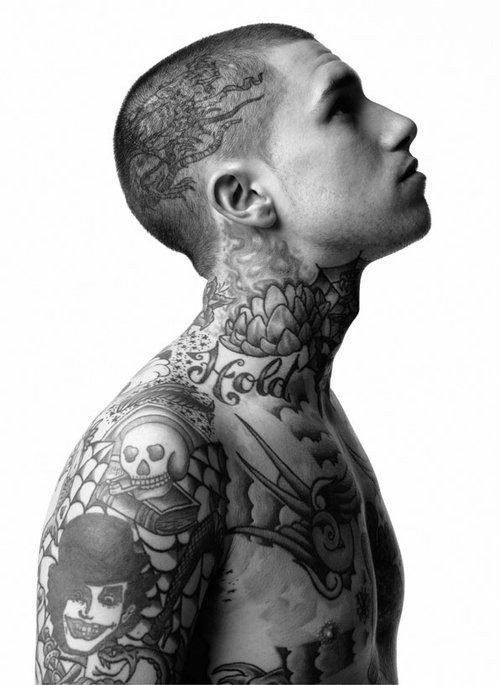 1-Black-and-White-Portrait-of-Man-with-Neck-Head-Tattoos