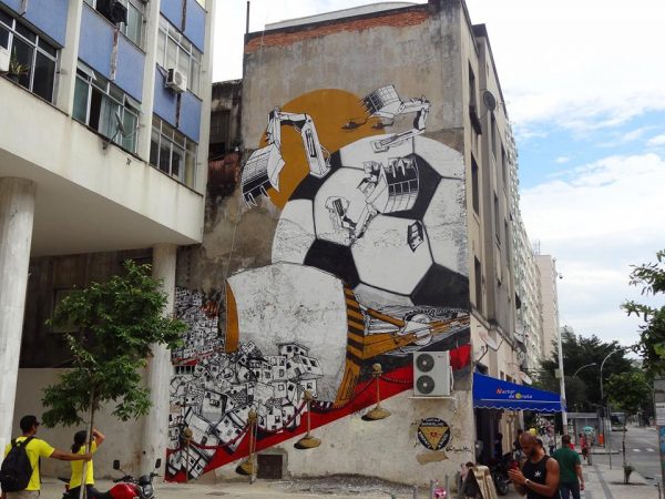 Street-Art-FIFA-World-Cup-in-Rio-de-Janeiro-Brazil-From-Anti-Copa-Mural-Project-organized-by-Colorrevolution-e.V.-and-Amnesty-International-Brazil.-By-B.ShantiA.Signl-in-Rio-de-Jainero-B