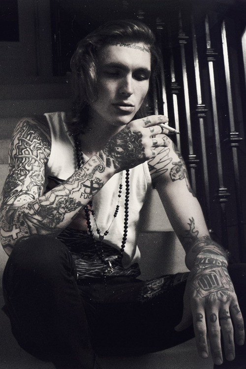 Homem Tatuado (46). 
